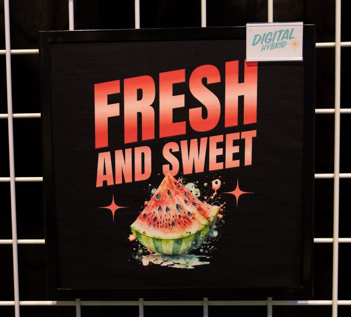 Close up of a t-shirt design featuring a watermelon that says "fresh and sweet"