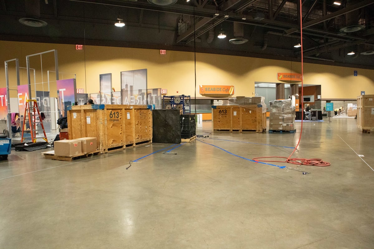 Image of how our space at Impressions Long Beach looked before set up. 613 Originals crate is visible